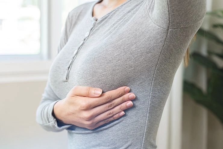 cuales son los sintomas del cancer de mama